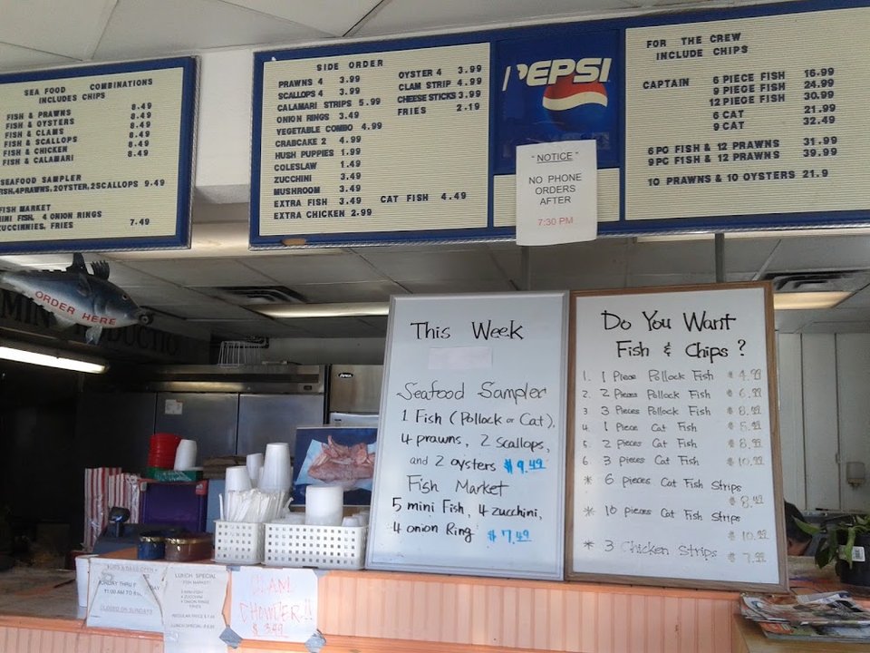 Seafood menu with sides and combination plates.