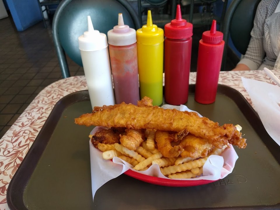 Printed menu with fried fish and seafood options.