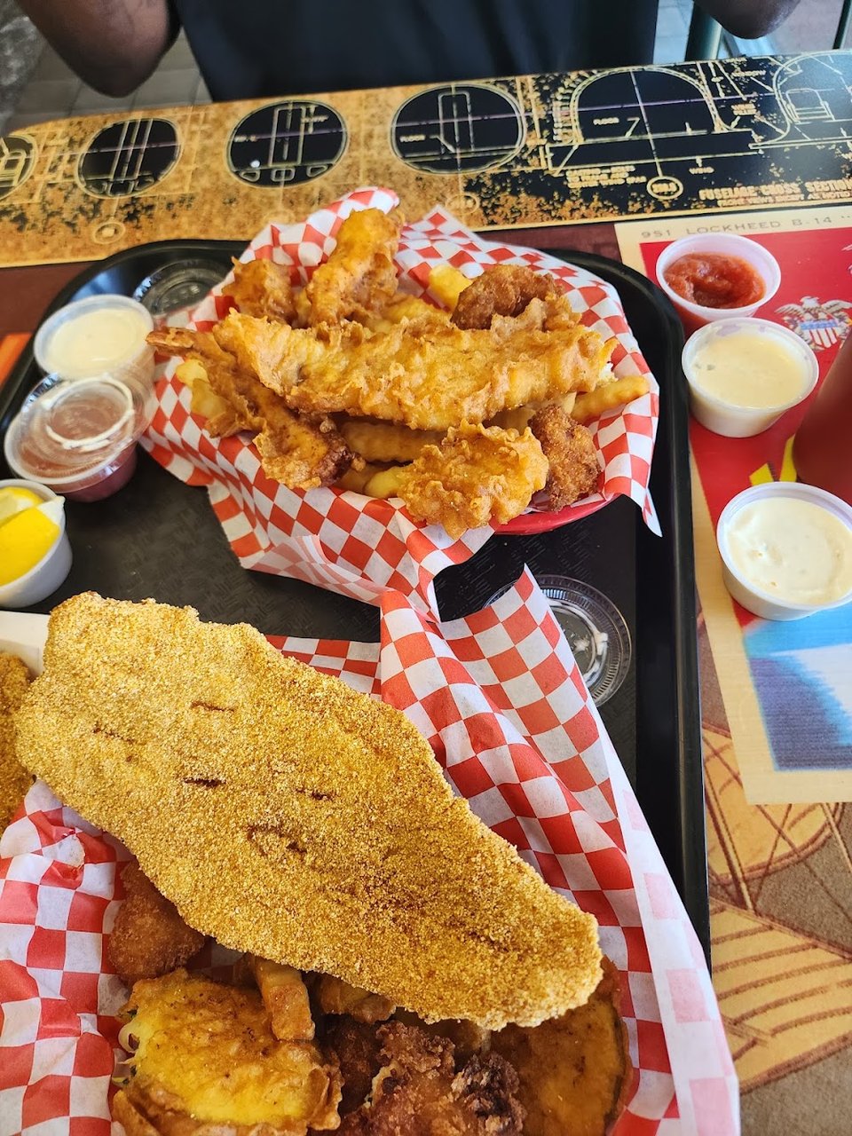 Seafood menu with sides and combination plates.
