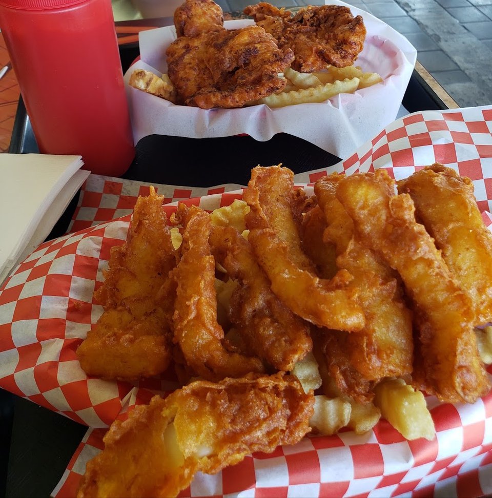 Seafood menu with sides and combination plates.