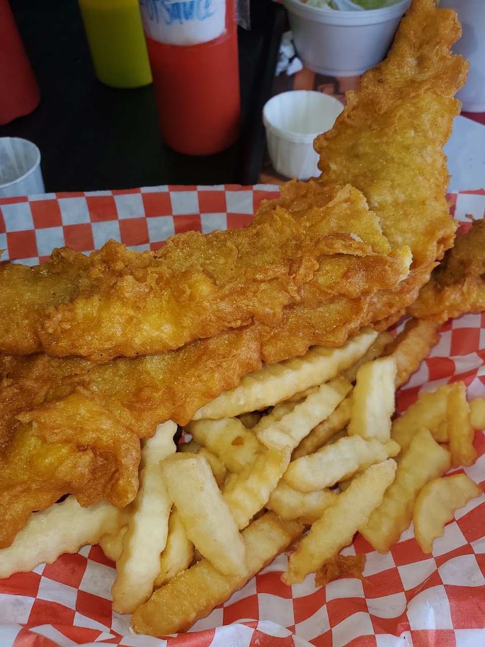 Printed menu with fried fish and seafood options.