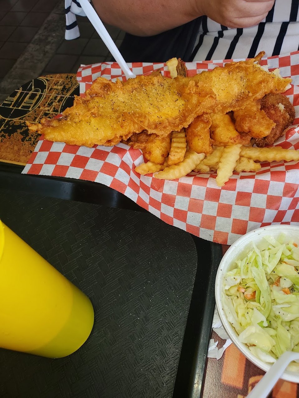 Menu page listing pollock, cod, and prawns.