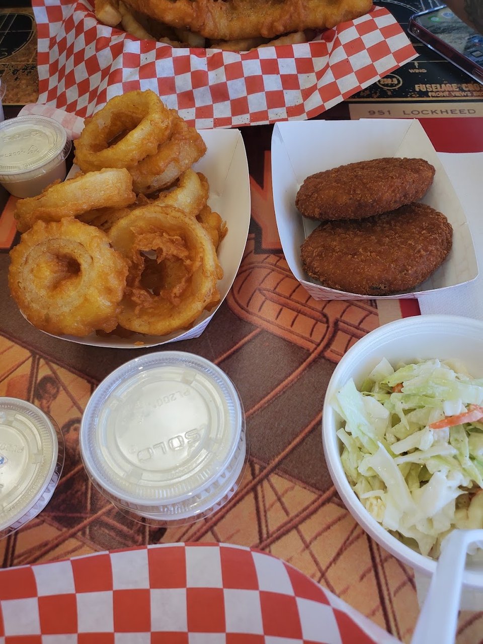 Restaurant menu showing dinner plates and small orders.