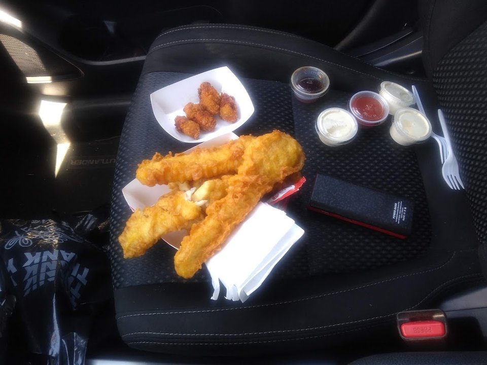 Printed menu with fried fish and seafood options.