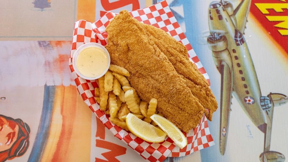 Printed menu with fried fish and seafood options.